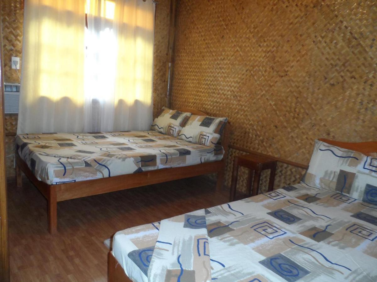 Victoria Guest House And Cottages Puerto Princesa Стая снимка