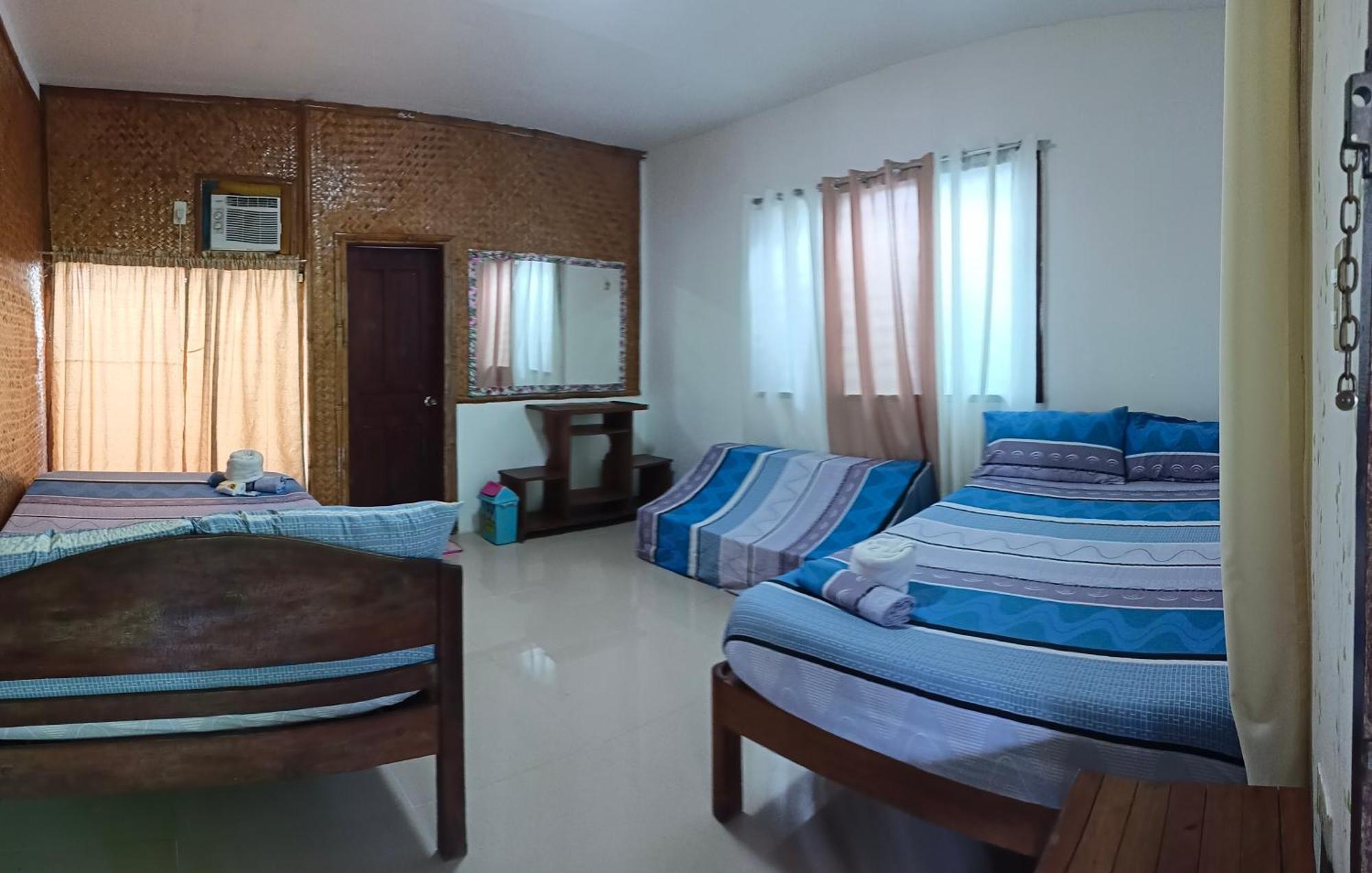 Victoria Guest House And Cottages Puerto Princesa Екстериор снимка