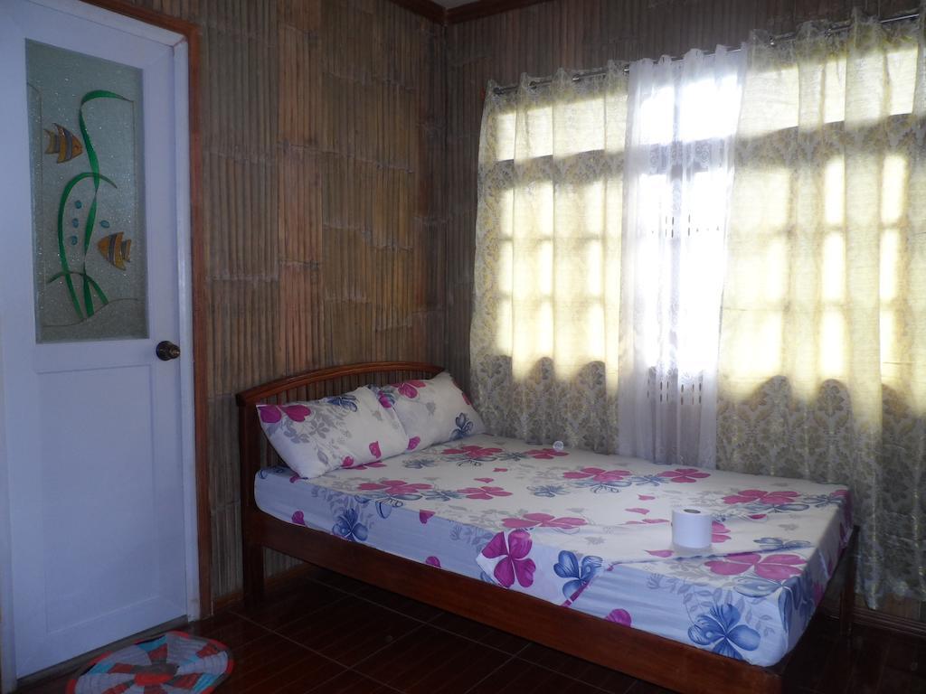 Victoria Guest House And Cottages Puerto Princesa Стая снимка